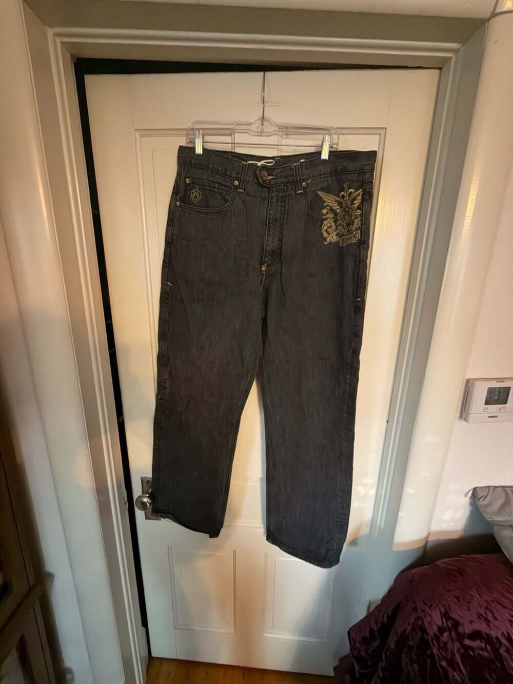 Eight 732 Y2K Black Denim Jeans with Embroidered Wings and Crest Detail